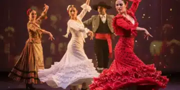 Danza Española 2026: Renacimiento de Estilos Flamenco, Clásico y Folclórico Bailarines de danza española en un escenario, con una bailaora de flamenco en primer plano y otros estilos tradicionales al fondo, simbolizando el renacimiento cultural.
